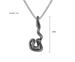 Detailed macro view of 55mm retro snake pendant with vintage steel scales texture