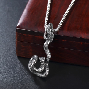 Vintage silver snake pendant necklace for men with detailed scales on a box chain