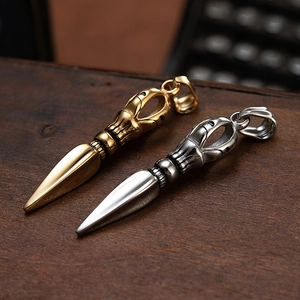 Religious style Vajra pestle pendants in gold and silver finish stainless steel