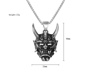 Detail view of retro Hannya mask pendant with 40mm height and 25mm width dimensions