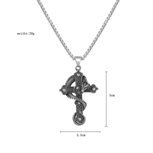 Detail view showing dimensions of vintage dragon cross pendant made of stainless steel