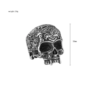 Macro shot of vintage skull ring with baroque floral texture, 34g weight and 33mm height
