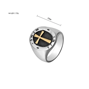 Detailed macro view of retro punk steel signet ring with gold cross and 13g weight