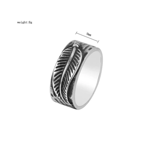 Detailed view of retro punk feather relief ring with 9mm width and 8g weight specs