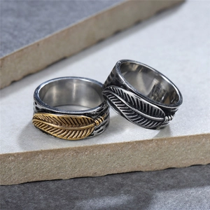 Retro punk style feather textured stainless steel wide ring set in silver and gold finish