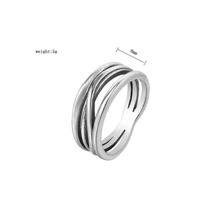 Detail view of silver multi-layer wire ring showing 8mm width and 5g product weight