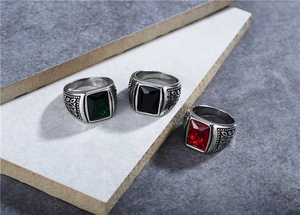 Retro men's rings featuring rectangular gemstone colors of red, black, and emerald green