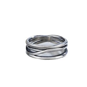 Vintage style multi-layered interwoven stainless steel ring with a retro oxidized finish