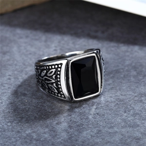 Vintage men's titanium steel ring featuring a rectangle black gemstone and floral relief