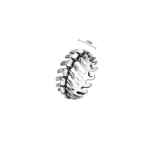 Detail view of 10mm wide vintage titanium steel ring with gothic skeletal design