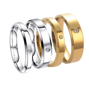 Anillos de pareja de acero de titanio de calidad con incrustaciones de diamante en oro y plata