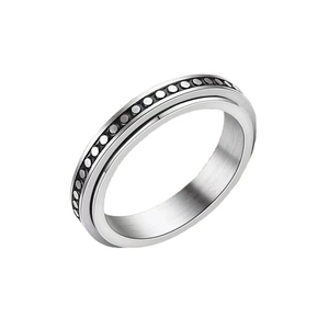 Stainless steel 4mm spinner ring with a stylish dotted outer band for stress relief and anxiety