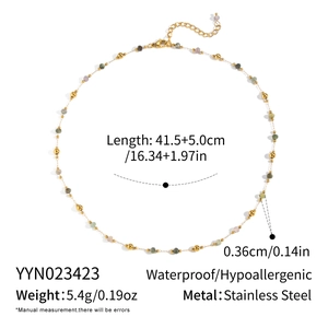Detail of stainless steel emerald bead necklace with waterproof and hypoallergenic features