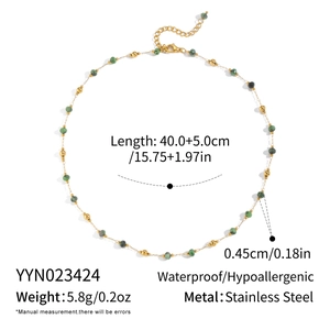 Detail view of emerald green stone necklace with size parameters and stainless steel specs