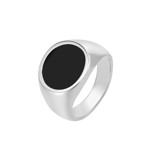 Polished silver titanium steel signet ring with a round black enamel face on white background