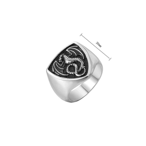 Macro detail of 20mm men's signet ring with vintage dragon relief in stainless steel