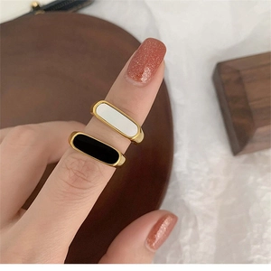 Minimalist gold titanium steel ring set with geometric black and white shell inlays