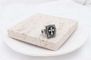 Macro detail of a vintage rectangular cross ring with London engraving on stone