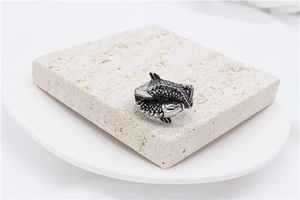 Detailed close-up of retro titanium steel koi fish ring showing scaled texture details