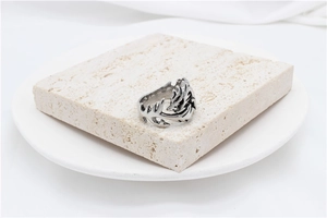 Detailed macro view of the retro silver dragon ring with intricate scale texture