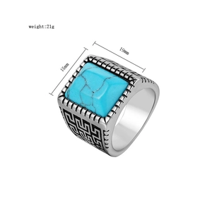 Anello retrò da uomo in acciaio con turchese blu e motivo a greca inciso