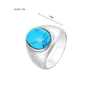 Detail view of the silver titanium ring with dimensions 18mm turquoise and 13g weight