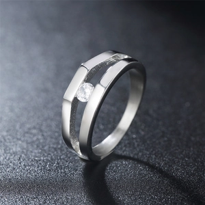 Minimalist silver tension set ring with parallel bands and a sparkling zircon stone