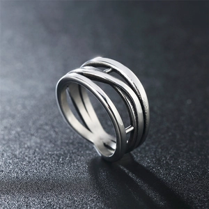 Minimalist irregular triple layered stainless steel ring with polished silver finish