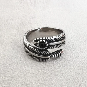 Retro titanium steel feather ring with black center stone and oxidized vintage finish