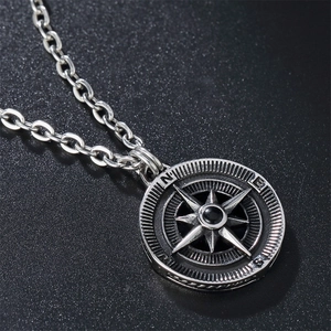 Retro compass pendant necklace in silver stainless steel with black bead on a matte base