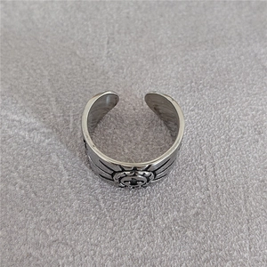 Vintage eagle feather open ring in titanium steel with engraved floral sun totem