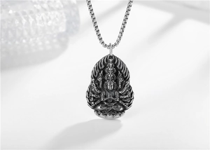 Detailed close-up of retro Thousand-Hand Guanyin pendant with vintage oxidized finish