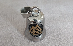 Detail of a Viking bell pendant in stainless steel with a golden Valknut symbol