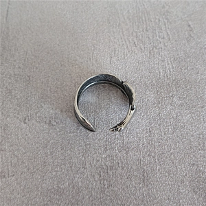 Vintage stainless steel open feather ring with detailed oxidized texture for men