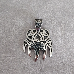 Viking bear paw pendant with Celtic knot details in vintage gray titanium steel