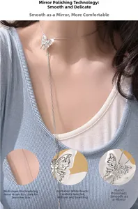 Detail of silver S925 butterfly necklace featuring white mother of pearl and mirror polish
