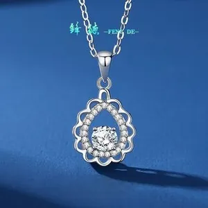 Detailed macro view of S925 silver necklace with teardrop moissanite pendant