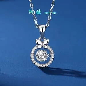 Close-up of 925 silver necklace featuring a bowknot and a round moissanite pendant