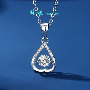 Macro view of S925 sterling silver waterdrop pendant with dancing moissanite center