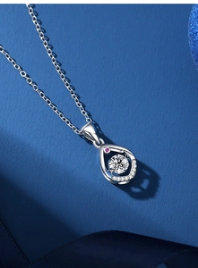 Close-up of S925 silver water drop pendant with a large sparkling round center stone