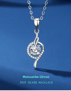 Macro view of S925 silver necklace pendant with sparkling heart moissanite and tiny diamonds