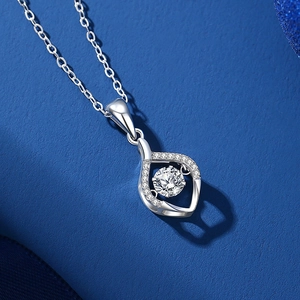 Elegant S925 sterling silver necklace with a moving heart moissanite pendant on blue background