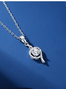 Macro shot of S925 silver heart necklace with 1-carat moissanite and pavé set pendant