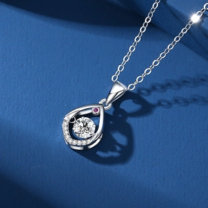 Waterdrop S925 silver necklace featuring a sparkling heart moissanite pendant on blue background