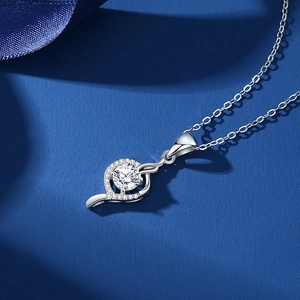 S925 silver heart necklace with 1 carat moissanite pendant on a dark blue background