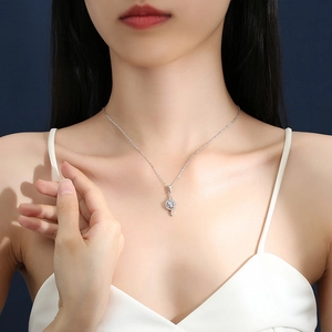 Elegant s925 silver heart swirl necklace with 1 carat moissanite pendant on female model
