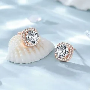 Close-up of S925 silver leaf earrings with rose gold finish and pavé cubic zirconia