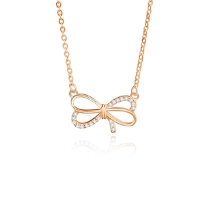 Collier nœud en or rose avec pendentif en zircone et chaîne à maillons fins