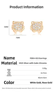 Macro detail of rose gold cat stud earrings with cubic zirconia and 6x7mm size mark