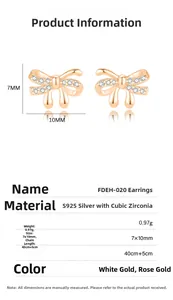 Détails macro des boucles d'oreilles nœud en argent S925 avec zircons en or rose